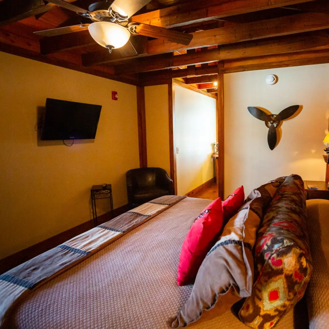 Warmly lit rustic bedroom