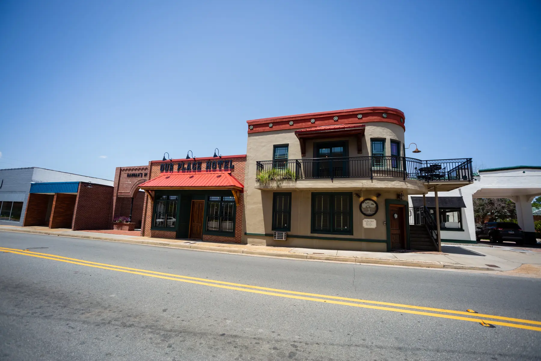 Red-roofed building with balcony