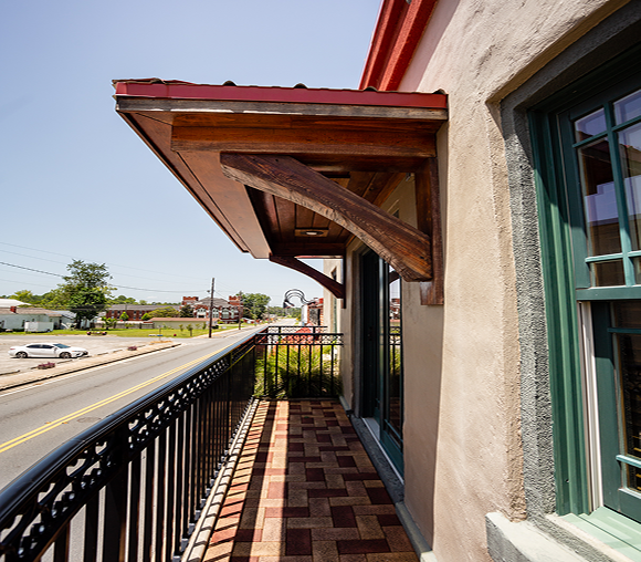 Balcony view with street and sky