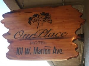 Our Place Hotel Sign