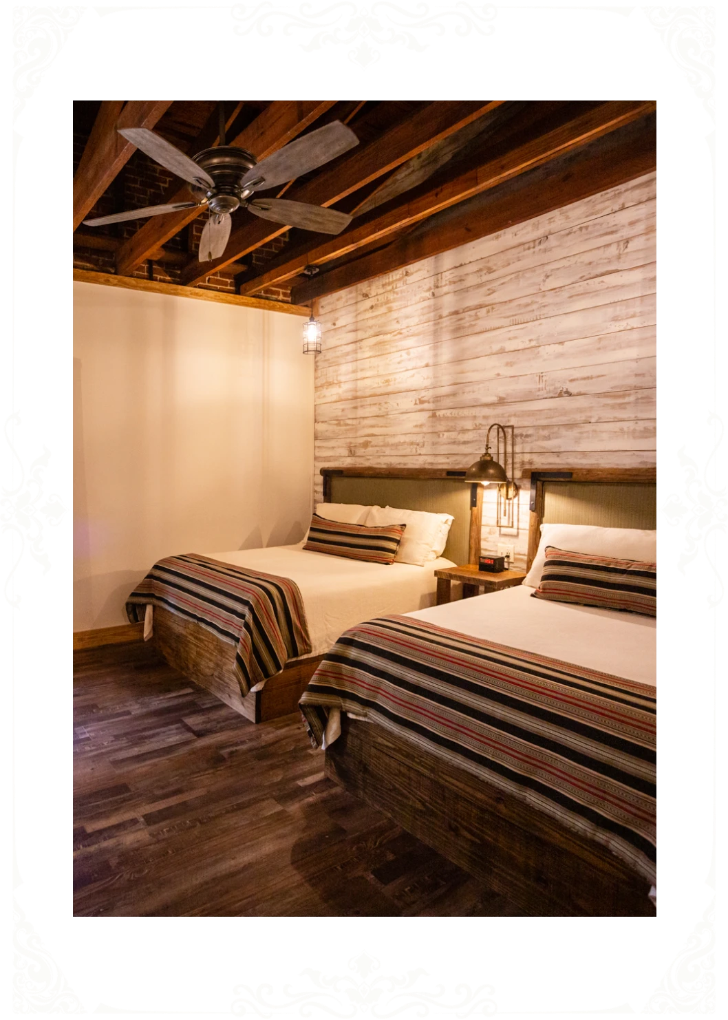 Twin beds in a warm-toned room